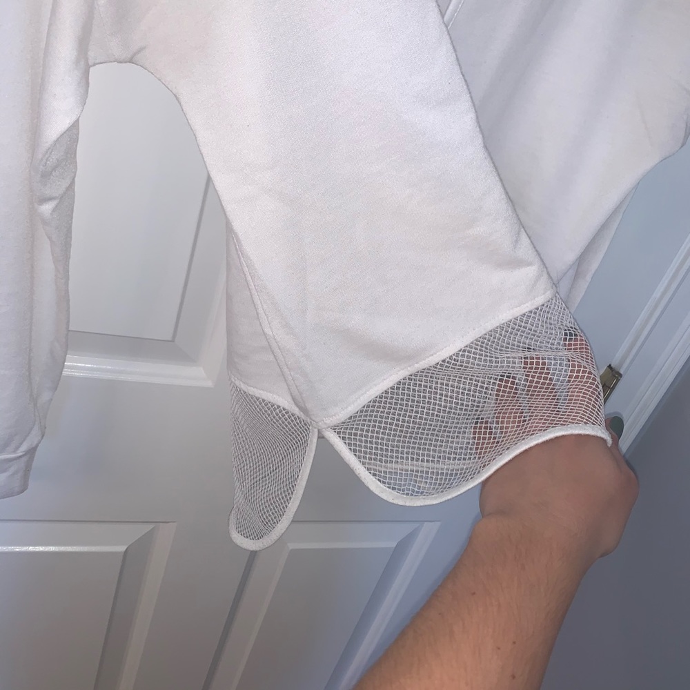 White Pull Over With Mesh Bottom - image 3